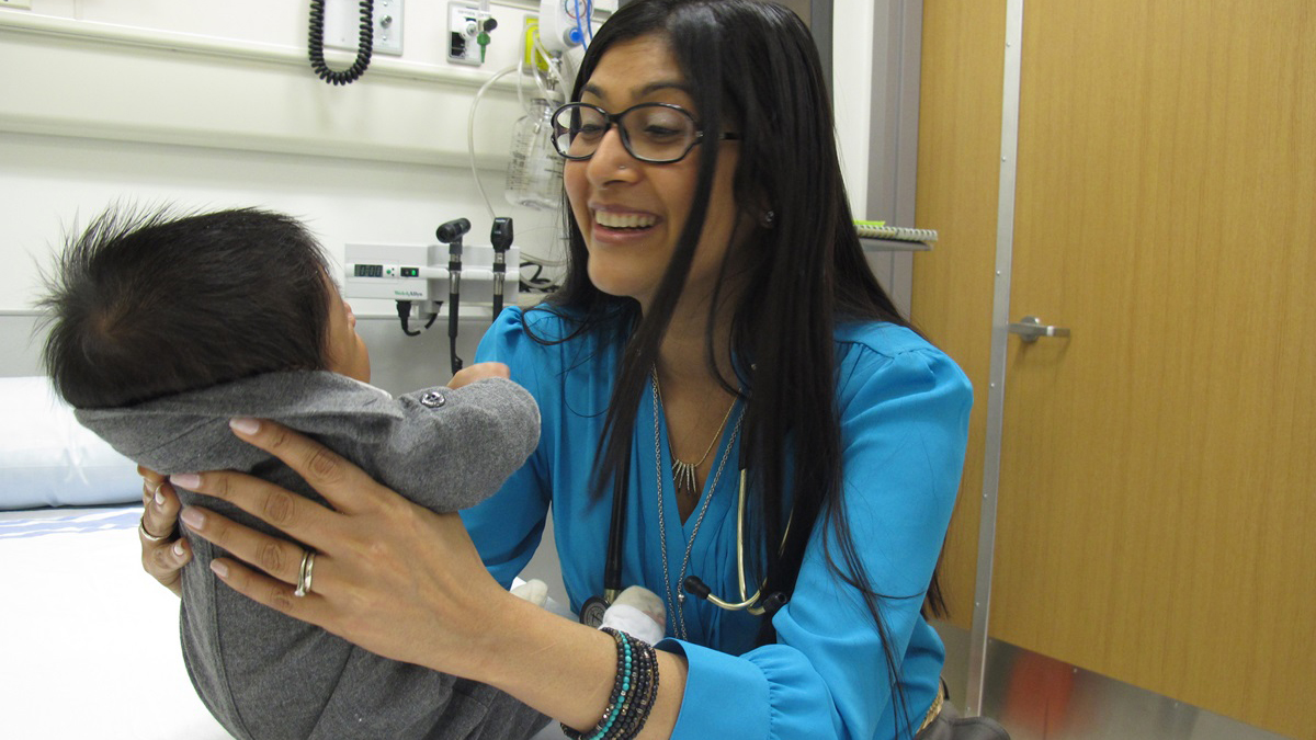 Dr. Samina Ali examines a child