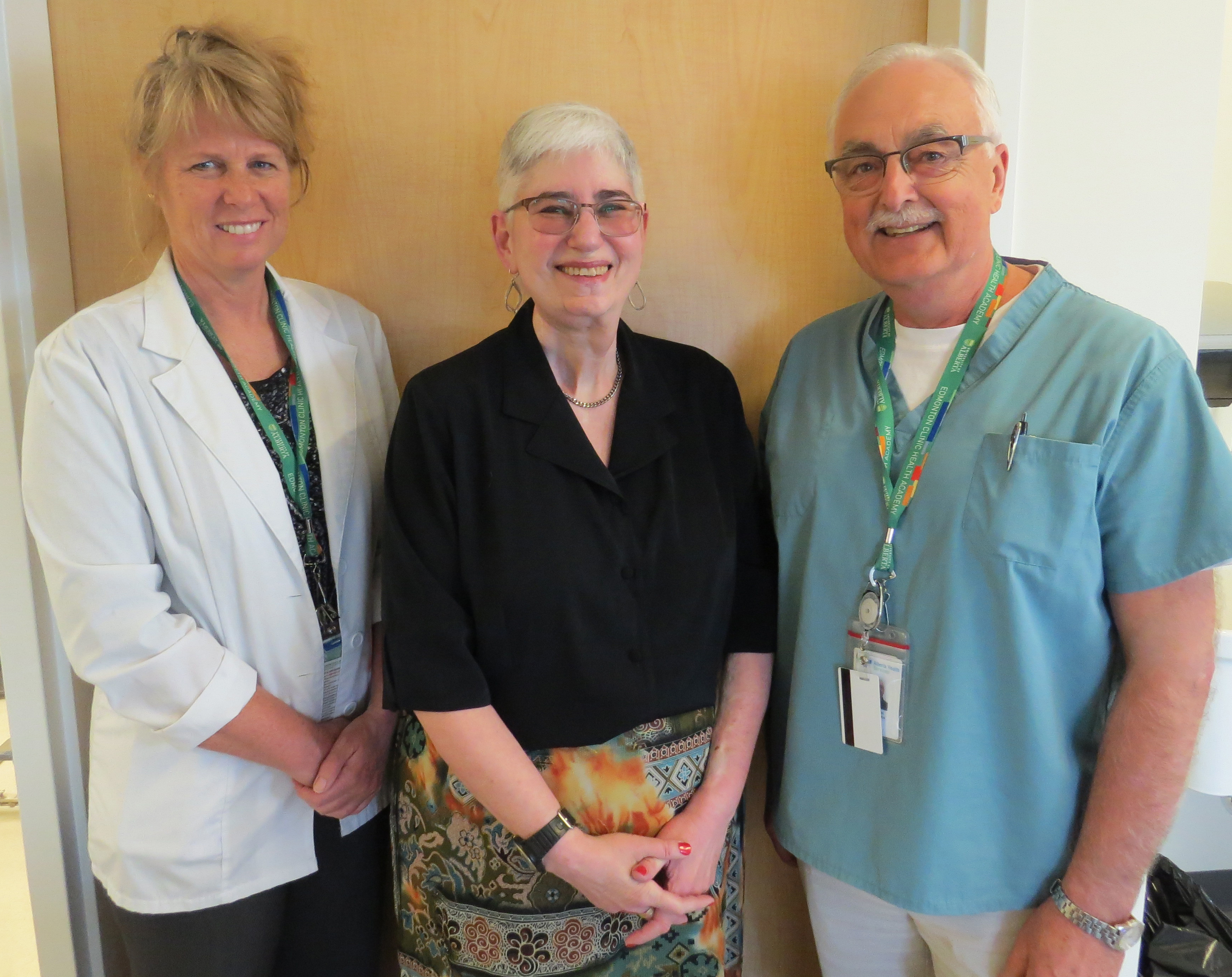 School of Dentistry patient, Pam Hofmann (middle), seen with her oral healthcare team - Arlynn Brodie (left) and Tom Stevenson (right)
